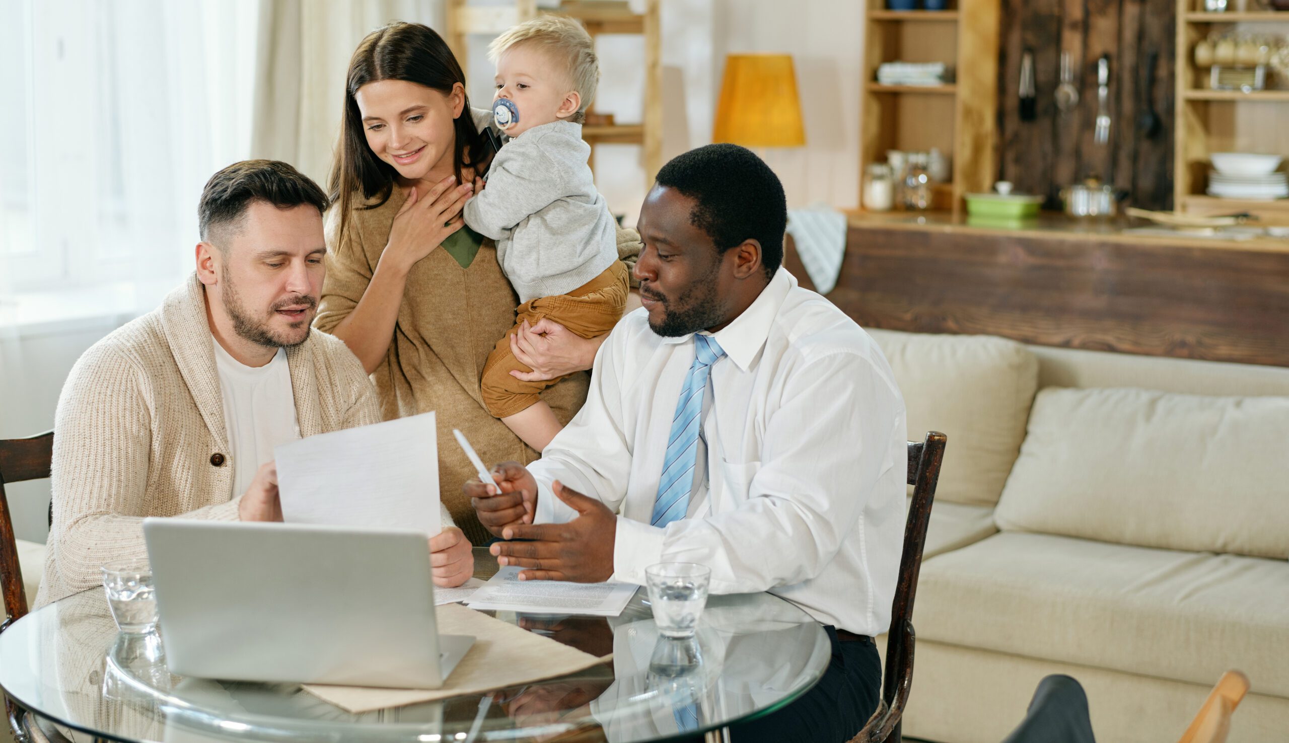 Family Having A Discussion On A Insurance Agent